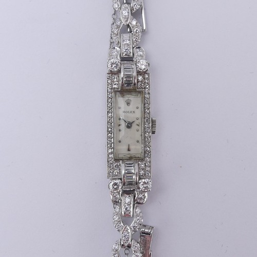 A Rolex Art Deco lady's diamond set Cocktail Watch, the rectangular signed dial with signed precision 17-rubies movement, all mounted in diamond set platinum, 19cm long, total weight 41g, running, minute hand loose.