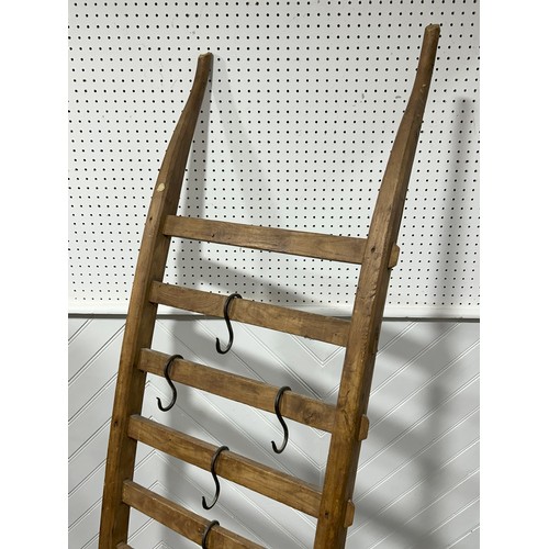 An antique style pine hanging wall Rack, with five loose iron hooks, W ...