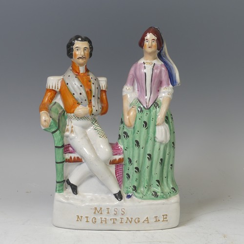 41 - A mid-19th century Staffordshire pottery flatback figural group, Miss Nightingale, circa 1855, model... 