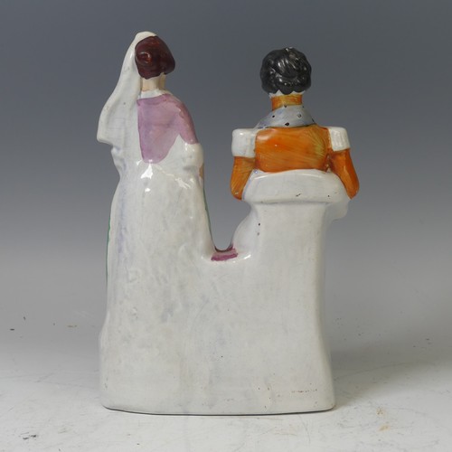 41 - A mid-19th century Staffordshire pottery flatback figural group, Miss Nightingale, circa 1855, model... 