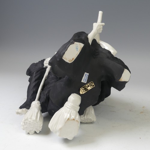 42 - 'Laughing Witches', a ceramic model of three witches on broomsticks, by Algora, Spain, decorated in ... 