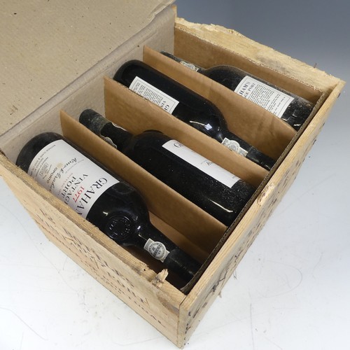 80 - Port: Twelve bottle of Grahams 1977 Vintage Port, in original wooden case.