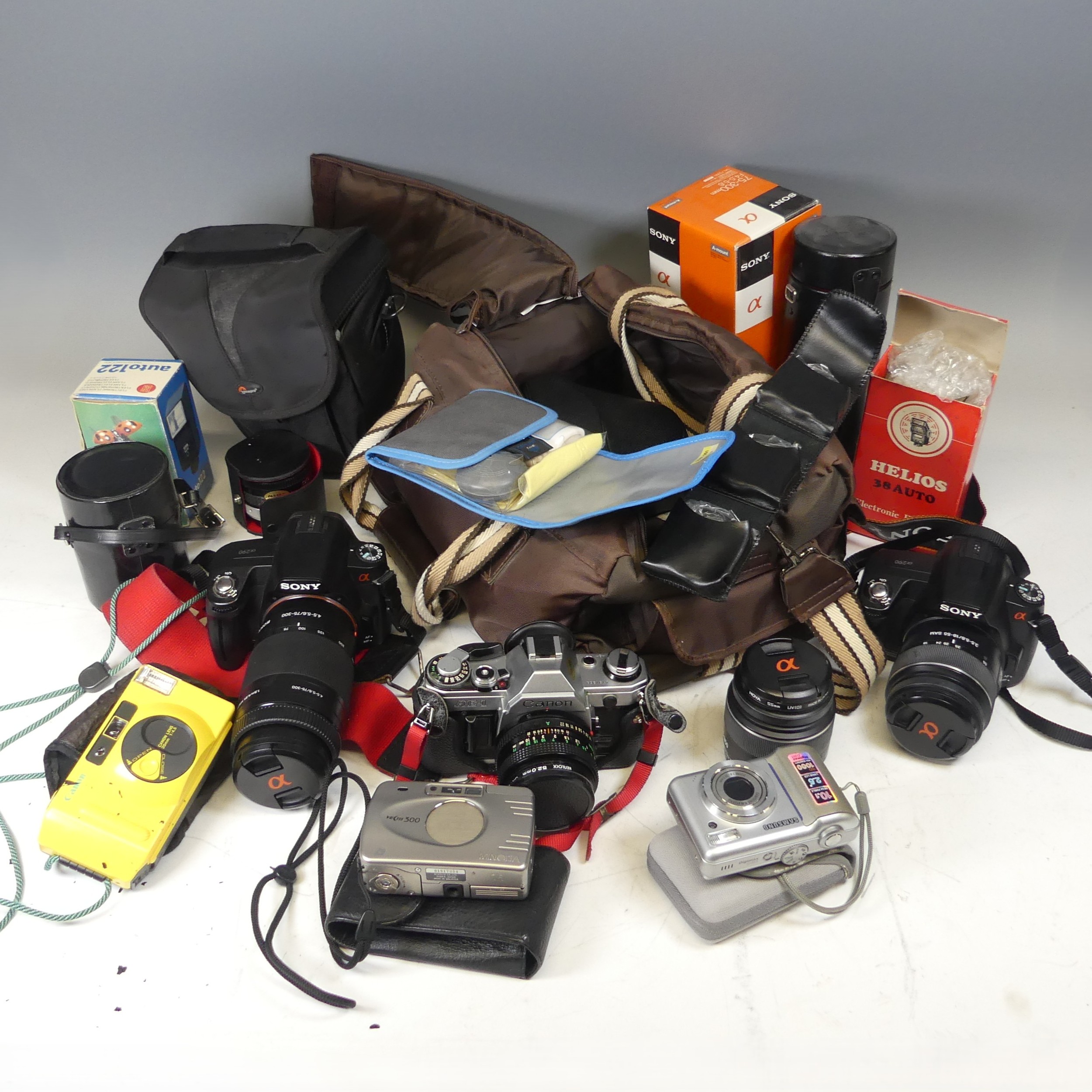 An interesting collection of Cameras and related equipment, including ...