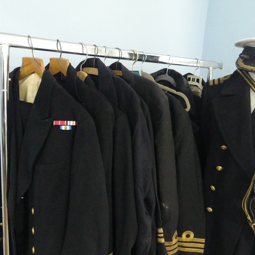 68 - A Family Royal Navy Military Uniform Collection, the collection mostly of Captain Richard J Campbell... 