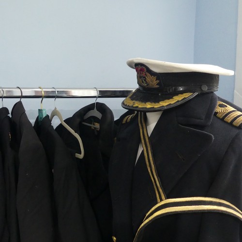 68 - A Family Royal Navy Military Uniform Collection, the collection mostly of Captain Richard J Campbell... 