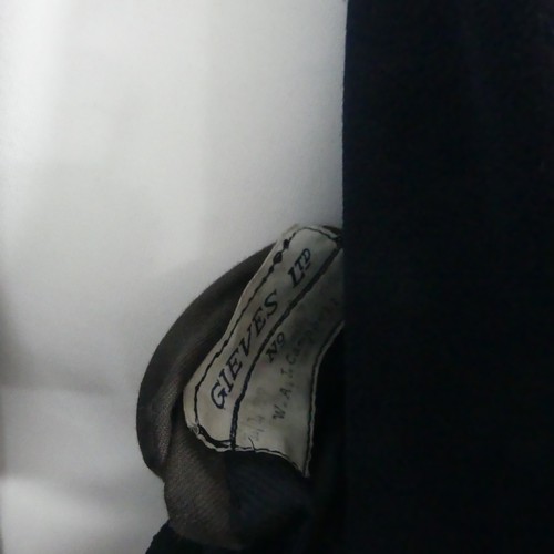 68 - A Family Royal Navy Military Uniform Collection, the collection mostly of Captain Richard J Campbell... 