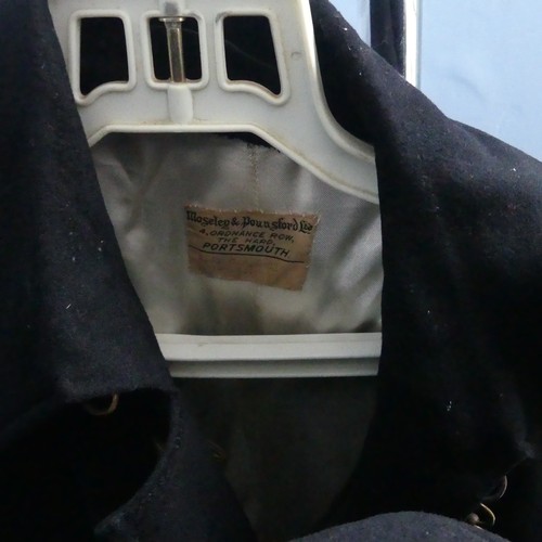 68 - A Family Royal Navy Military Uniform Collection, the collection mostly of Captain Richard J Campbell... 