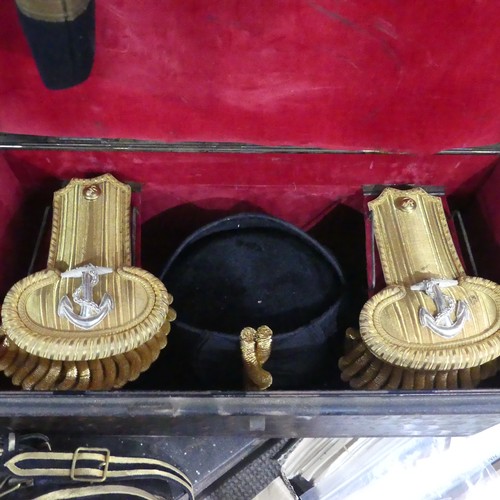 68 - A Family Royal Navy Military Uniform Collection, the collection mostly of Captain Richard J Campbell... 