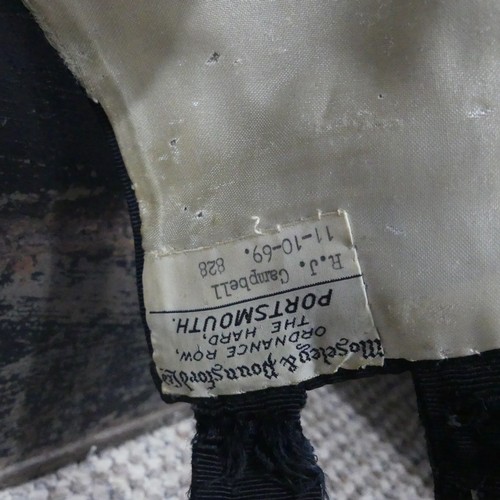 68 - A Family Royal Navy Military Uniform Collection, the collection mostly of Captain Richard J Campbell... 