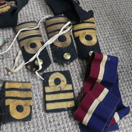 68 - A Family Royal Navy Military Uniform Collection, the collection mostly of Captain Richard J Campbell... 