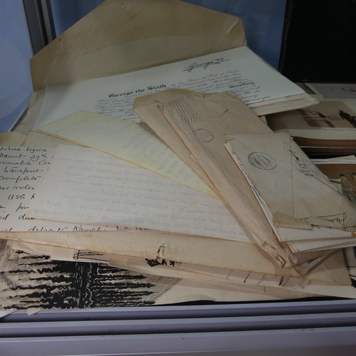 106 - A quantity of late Victorian family Ephemera, including photograph, postcard and scrap albums, depic... 