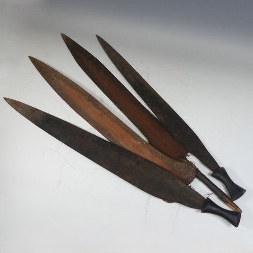 8 - A pair of early 20th century Congolese iron currency spear Heads, with rounded bases, L 82.5 cm, tog... 