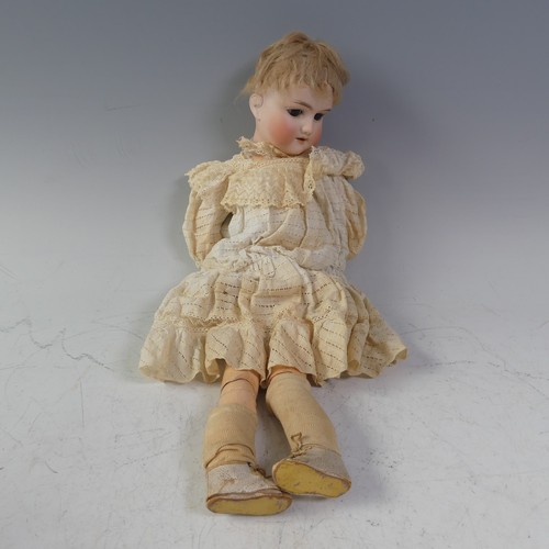 59 - An Armand Marseille bisque china head Doll, with brown glass sleeping eyes, open mouth and teeth, on... 