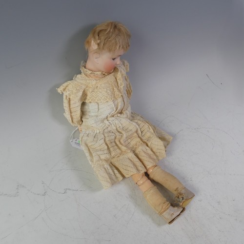 59 - An Armand Marseille bisque china head Doll, with brown glass sleeping eyes, open mouth and teeth, on... 