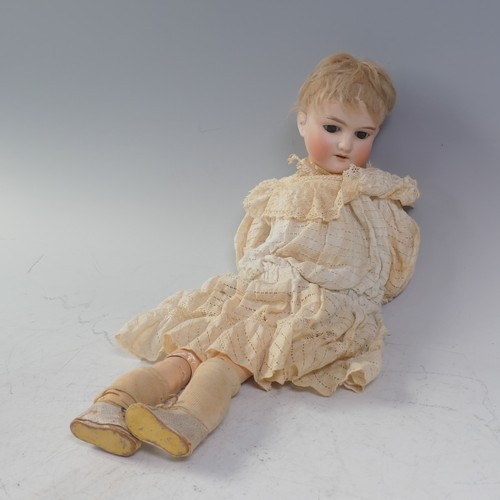59 - An Armand Marseille bisque china head Doll, with brown glass sleeping eyes, open mouth and teeth, on... 
