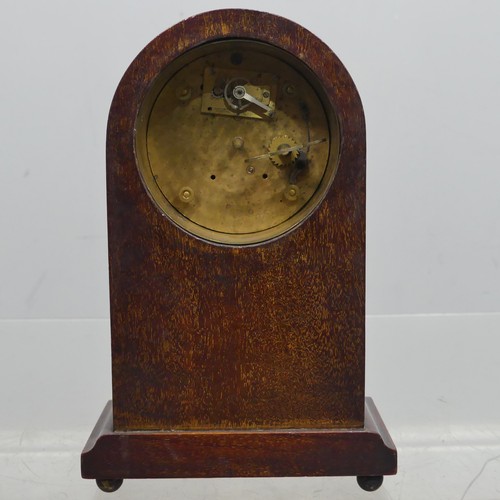 37 - A small early 20th century mahogany Zenith eight-day mantel Clock, the arched case decorated with st... 