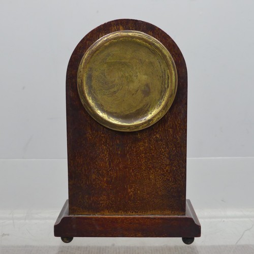 37 - A small early 20th century mahogany Zenith eight-day mantel Clock, the arched case decorated with st... 