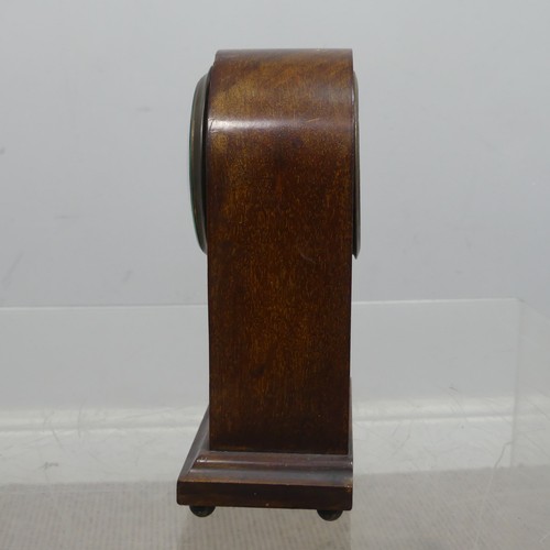 37 - A small early 20th century mahogany Zenith eight-day mantel Clock, the arched case decorated with st... 