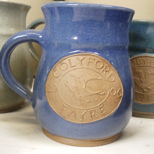 39 - A pair of late 20th century Flagons, H 38 cm, together with a collection of Colyford Fayre Jugs, dat... 