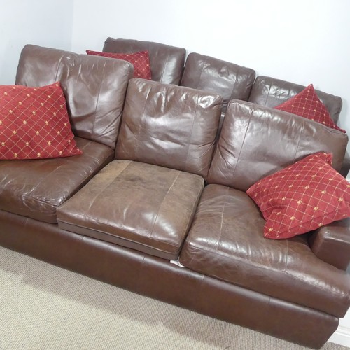 22 - A pair of Derwent brown leather upholstered three-seat Sofas, W 210 cm x H 90 cm x D 100 cm. (2)... 