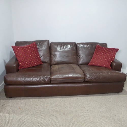22 - A pair of Derwent brown leather upholstered three-seat Sofas, W 210 cm x H 90 cm x D 100 cm. (2)... 