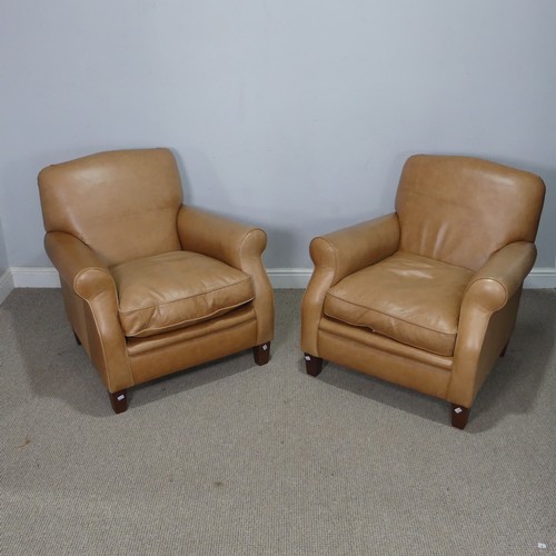 21 - A pair of tan leather unholstered Armchairs, W 72 cm x H 90 cm x D 70 cm, purchased by the Vendor fr... 
