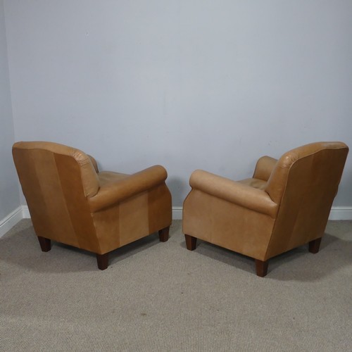 21 - A pair of tan leather unholstered Armchairs, W 72 cm x H 90 cm x D 70 cm, purchased by the Vendor fr... 
