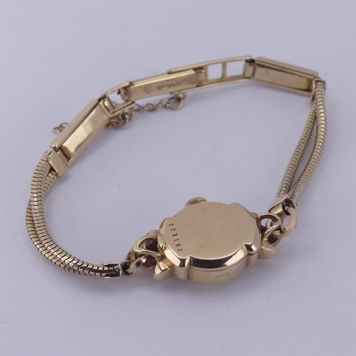 142 - A 9ct gold lady's Juvenia Wristwatch, with signed 17-jewels mechanical movement, 14.2mm diameter, on... 