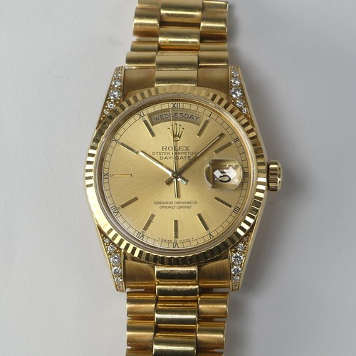 143 - A Rolex Oyster Perpetual Day-Date 18ct gold Wristwatch, Ref. 18238, circa 1990's, with signed and je... 