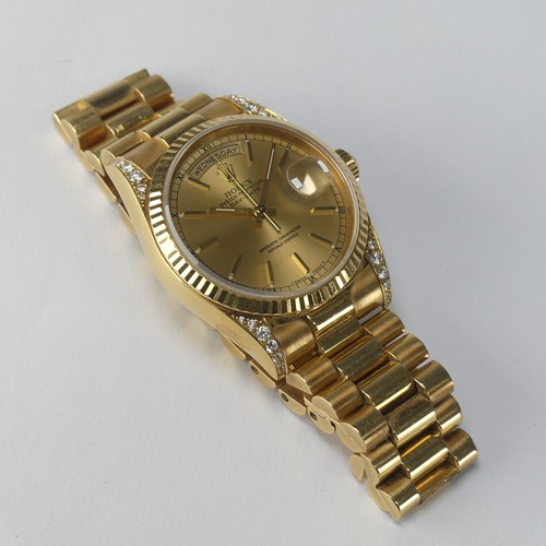 143 - A Rolex Oyster Perpetual Day-Date 18ct gold Wristwatch, Ref. 18238, circa 1990's, with signed and je... 