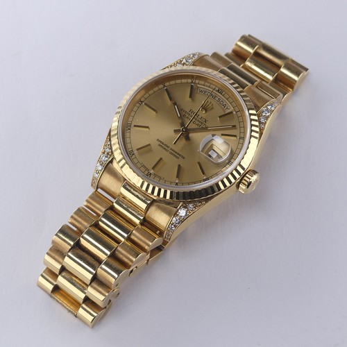 143 - A Rolex Oyster Perpetual Day-Date 18ct gold Wristwatch, Ref. 18238, circa 1990's, with signed and je... 