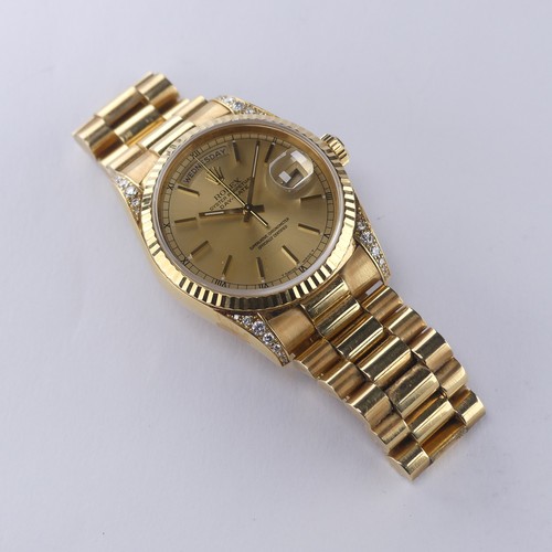 143 - A Rolex Oyster Perpetual Day-Date 18ct gold Wristwatch, Ref. 18238, circa 1990's, with signed and je... 