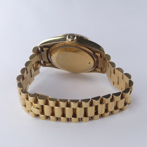 143 - A Rolex Oyster Perpetual Day-Date 18ct gold Wristwatch, Ref. 18238, circa 1990's, with signed and je... 