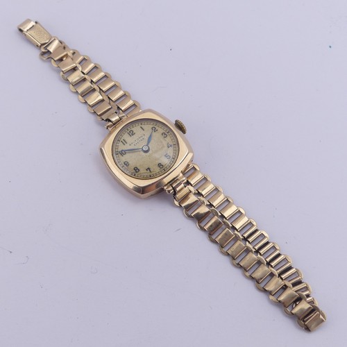 144 - A 9ct gold lady's Wristwatch, the gilt dial signed for Bruford's, Exeter, Swiss 15-jewels Pinnacle m... 
