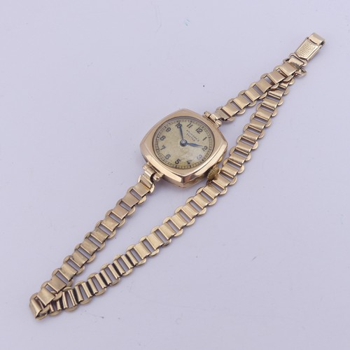 144 - A 9ct gold lady's Wristwatch, the gilt dial signed for Bruford's, Exeter, Swiss 15-jewels Pinnacle m... 