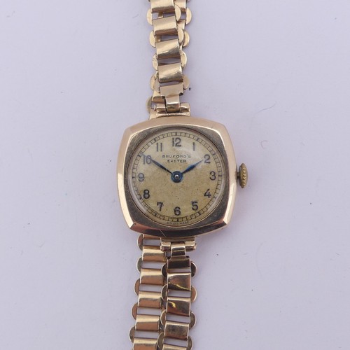 144 - A 9ct gold lady's Wristwatch, the gilt dial signed for Bruford's, Exeter, Swiss 15-jewels Pinnacle m... 