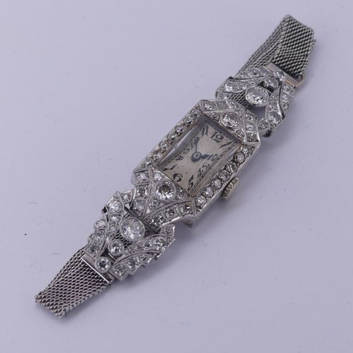 145 - An Art Deco lady's diamond Cocktail Watch, the unsigned rectangular dial with Arabic numerals, withi... 