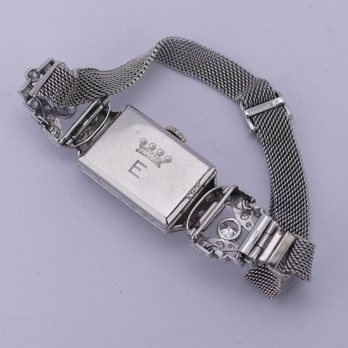 145 - An Art Deco lady's diamond Cocktail Watch, the unsigned rectangular dial with Arabic numerals, withi... 