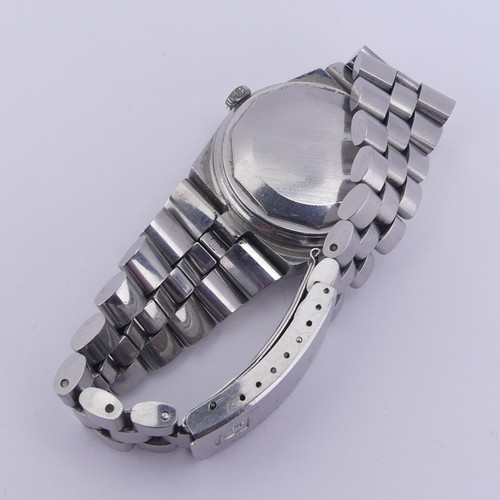 146 - A vintage Tissot PR 516 GL stainless steel automatic Wristwatch, with blue dial and red centre secon... 