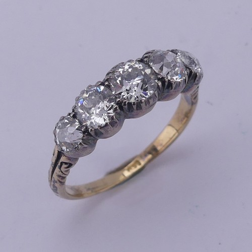 232 - A Victorian graduated five stone diamond Ring, total diamond weight approx. 1.96ct with the centre s...