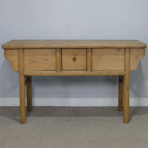 76 - A 20th century pine Chinese alter Table/Sideboard, the singular frieze drawer flanked by sliding cup... 