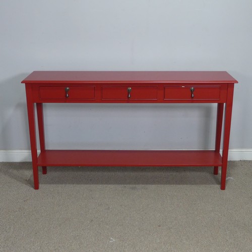 4 - A contemporary red painted console Table/Sideboard, the three drawers with brass drop handles, raise... 