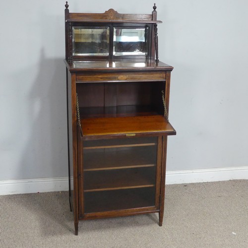2 - An Edwardian mahogany mirror-back music Cabinet, the fall front decorated with marquetry swag and ur... 