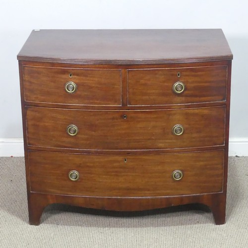 63 - A Georgian style mahogany bowfront Chest of Drawers, with brass loop swing handles, W 90 cm x H 80 c... 