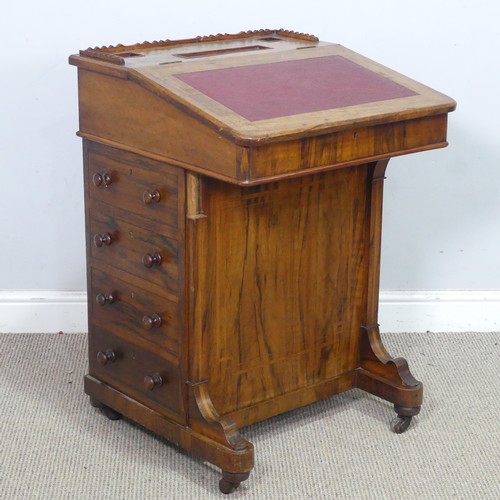 72 - A Victorian rosewood Davenport Desk, with red leather writing surface revealing a fitted interior, a... 