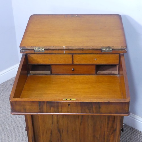 72 - A Victorian rosewood Davenport Desk, with red leather writing surface revealing a fitted interior, a... 