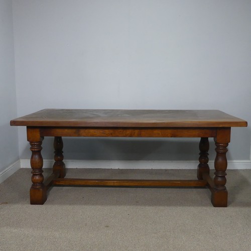15 - A 20th century Brights of Nettlebed oak refectory dining Table, the turned supports united by a 'H' ... 