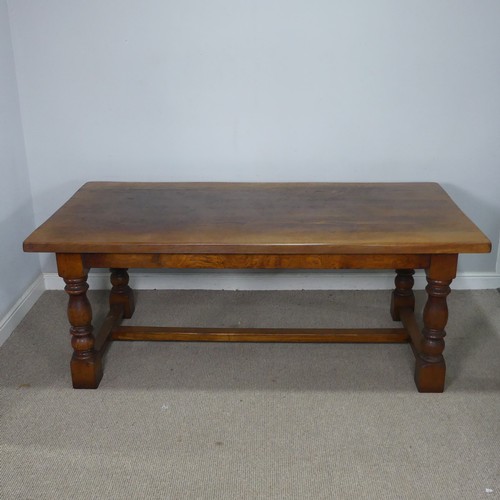 15 - A 20th century Brights of Nettlebed oak refectory dining Table, the turned supports united by a 'H' ... 