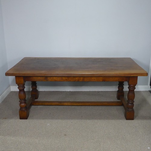 15 - A 20th century Brights of Nettlebed oak refectory dining Table, the turned supports united by a 'H' ... 