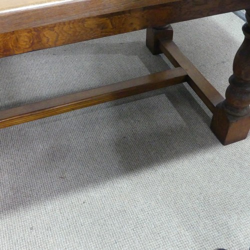 15 - A 20th century Brights of Nettlebed oak refectory dining Table, the turned supports united by a 'H' ... 